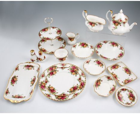 A collection of Royal Albert Old Country Roses table ware to include; six cups and saucers, gravy boat, salt and pepper, nine