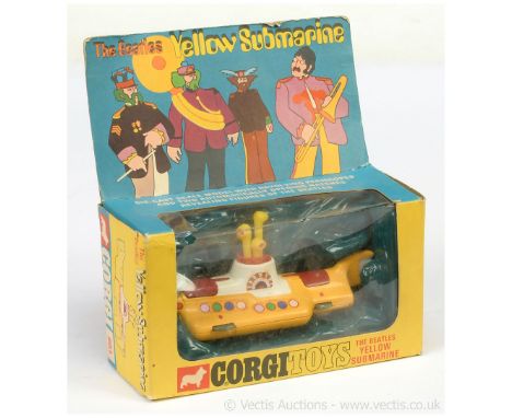 Corgi 803 "The Beatles" Yellow Submarine - finished in yellow, white, 2 x red hatches, 3-prong black propeller - overall cond