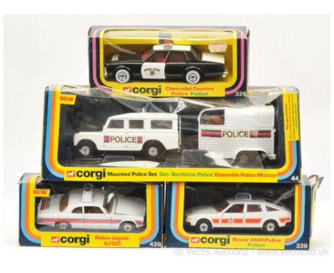 Corgi group of "Police" related to include 326 Chevrolet Caprice - black, white, red interior, whitewall tyres; 339 Rover 350