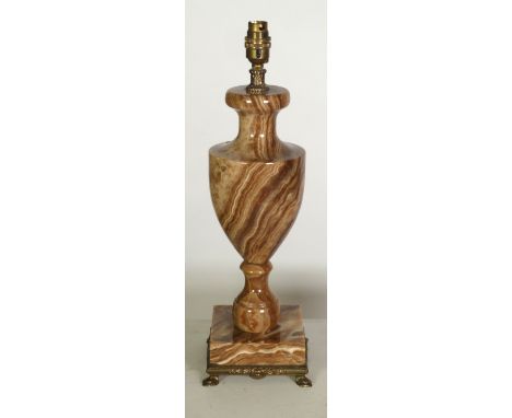20th CENTURY VARIEGATED BROWN AND FAWN HARDSTONE VASE SHAPED TABLE LAMP with gilt metal mounts and fabric shade