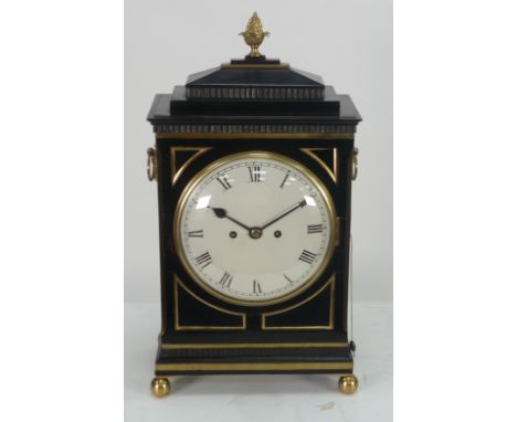 REGENCY EBONISED AND BRASS MOUNTED REPEATING BRACKET CLOCK, the 8" enamelled Roman dial powered by a twin fusee movement, str