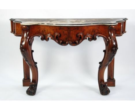 GOOD EARLY VICTORIAN FIGURED WALNUT SERPENTINE FRONTED CONSOLE TABLE WITH WHITE VEINED MARBLE TOP, the deep, shaped frieze ou