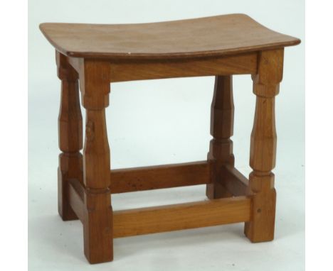 'MOUSEMAN' THOMPSON, MID TWENTIETH CENTURY CARVED LIGHT OAK STOOL, the adze cut oblong top above a plain frieze and raised on