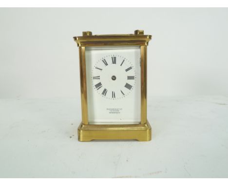 R &amp; Co, EARLY TWENTIETH CENTURY FRENCH BRASS CARRIAGE CLOCK, RETAILED BY ROBINSON &amp; Co, SHREWSBAURY, WITH MOROCCO TRA