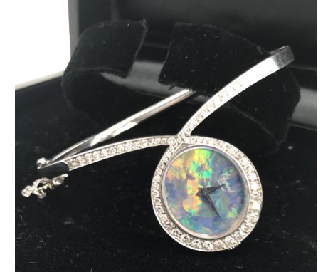 Chopard, Geneve: Damenschmuckuhr mit Opal und Brillanten, 750WGDAU aus Mitte der 1980 Jahre als Reif gestaltet, Ref.Nr.: 9307