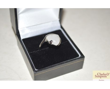 A boxed white metal and opal dress ring