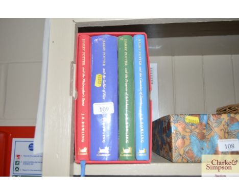 Four J K Rowling Harry Potter novels in single sleeve