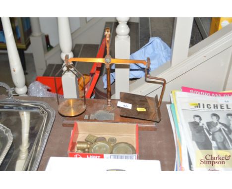 A set of postage scales and weights