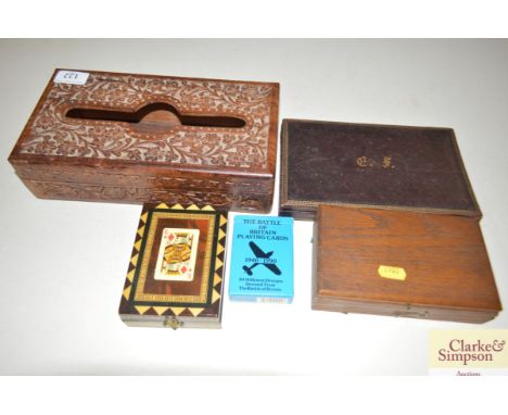 Various carved hardwood boxes; playing cards etc