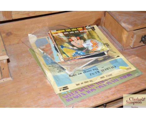 A small quantity of vintage 45rpm and LP records 