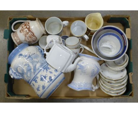 Six French coffee cups and saucers, a Royal Doulton jug, a/f, a blue and white relief mug, a teapot, Aberystwyth, a blue and 