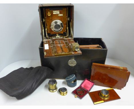 The Sanderson camera, early 20th Century, with original record book, lenses and accessories 
