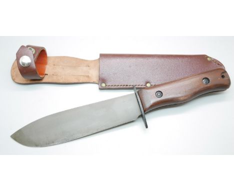 A Wilkinson RAF survival knife, with scabbard 