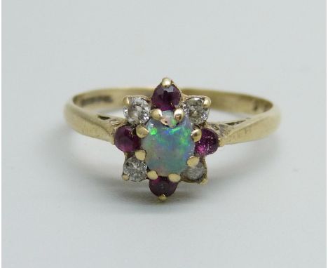 A 9ct gold, ruby, diamond and opal cluster ring, 1.7g, M, opal a/f 