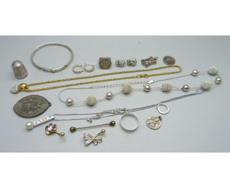 A Swarovski gold tone necklace, a Charles Horner thimble, two silver rings, two medallions, etc. 