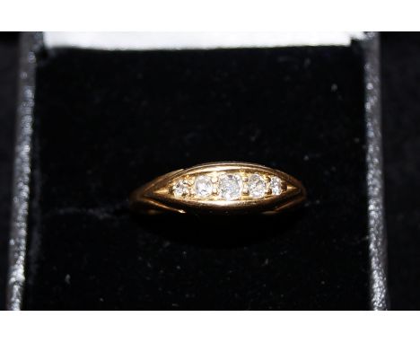 18ct gold ring set with 5 diamonds. Size R