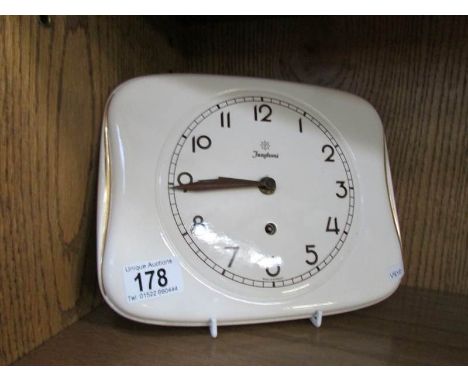 A 1950's Junghans pottery wall clock, no key