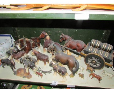 A shelf of horses including horse and dray