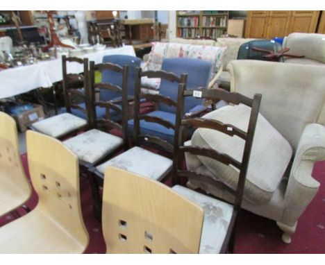 A set of 4 ladder back chairs