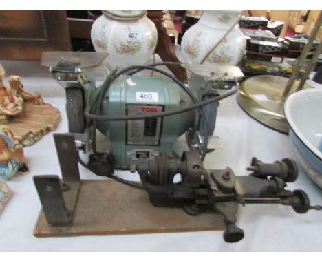 A bench grinder and a small lathe