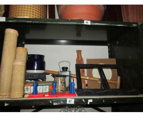 A shelf of assorted wooden items