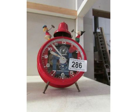 A vintage German Mickey Mouse alarm clock