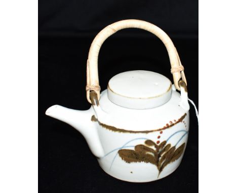 A DAVID LEACH (1911-2005) AT LOWERDOWN POTTERY TEAPOT &amp; COVER  with tenmoku, blue and iron red decoration against an off-