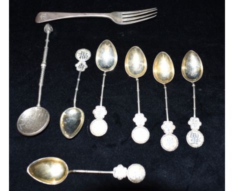 ASIAN &amp; PERUVIAN SILVER COIN SPOONS To include six teaspoons with gilt interior bowls, bamboo style stems and Asian chara