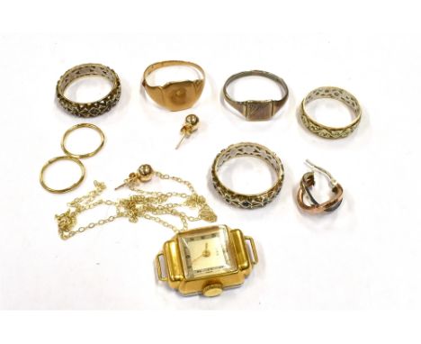 VARIOUS 9CT GOLD JEWELLERY ITEMS To include three eternity rings with silver filigree pierced and paste stone set centres wit