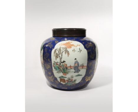 A MASSIVE CHINESE FAMILLE VERTE POWDER BLUE-GROUND OVOID VASE 19TH CENTURY Painted with four large cartouches enclosing scene