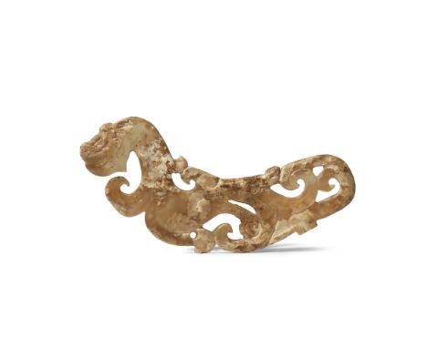 A CHINESE WHITE JADE 'DRAGON' PENDANT PROBABLY HAN DYNASTY The curved flattened plaque finely detailed with an animal head an