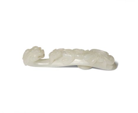 A CHINESE WHITE JADE BELTHOOK QING DYNASTY Decorated in high relief with a chilong clambering on the shaft, the terminal form