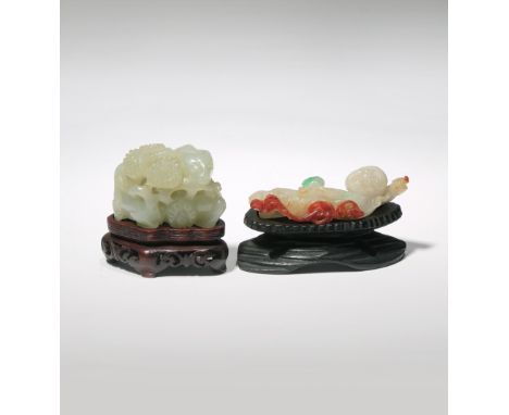 TWO SMALL CHINESE JADE CARVINGS LATE QING DYNASTY One carved from pale celadon nephrite as two recumbent deer with large flow