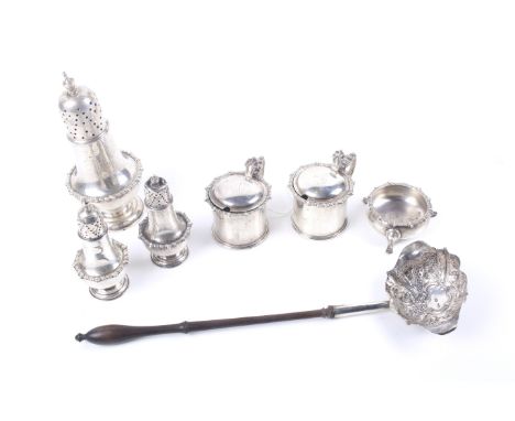 A late George II toddy ladle and a silver six piece cruet set. The toddy ladle with a cartouche shaped and fluted bowl emboss