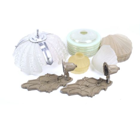 A collection of assorted Art Deco and later glass lamp shades. Including a pair of cast metal wall brackets, etc. Max. H30cm