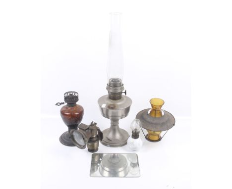 Two vintage oil lamps and a Miller carbide bicycle lamp. Max. H30cm