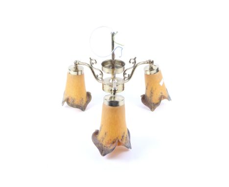 A 20th century Art de France brass ceiling light. Each of the three branches with marbled orange glass shades. H32.5cm