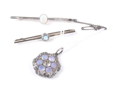 A small collection of jewellery including an 18th century paste cluster adapted as a pendant. An early 20th century platinum-