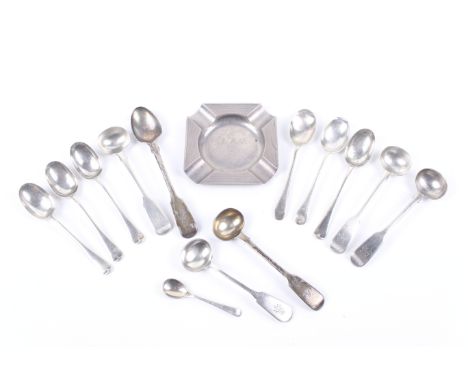 A silver ash tray and various tea and coffee spoons. The canted-square ash tray with engine turned borders and engraved with 