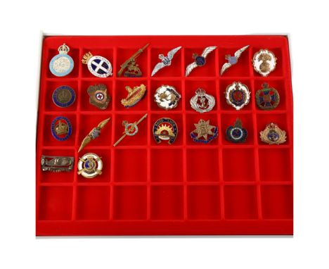 A collection of 23 military badges and sweetheart brooches, WW I and II periodCondition varies some damage to enamel on badge