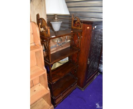 A modern hardwood shelf unit with double drawer base, width approx. 52cm