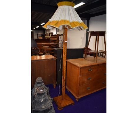 An Art Deco oak parquetry standard lamp, with vintage shade