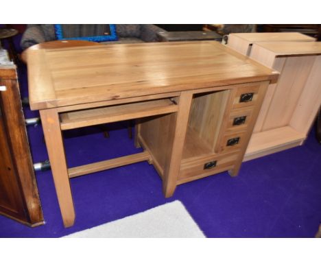 A modern golden oak computer desk, approx. 132 x 67cm, a few light marks but generally excellent