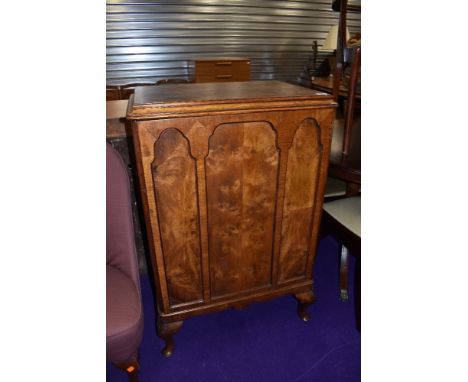 An early 20th Century panel cabinet, converted to wine cabinet, dimensions approx W68 D48 H105cm