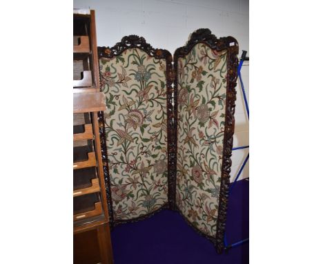 A 19th Century two panel room divider , foliate carved design frame with later embroidered panel