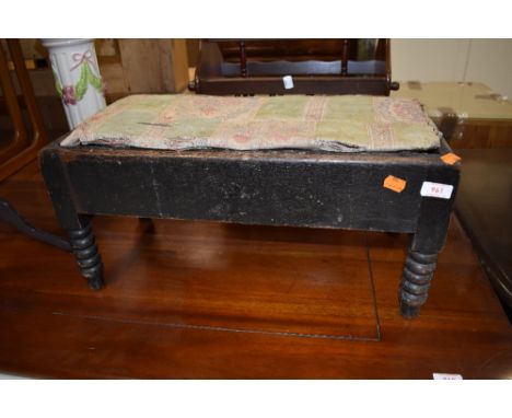 A dark stained Victorian double foot stool having bobbin turned legs