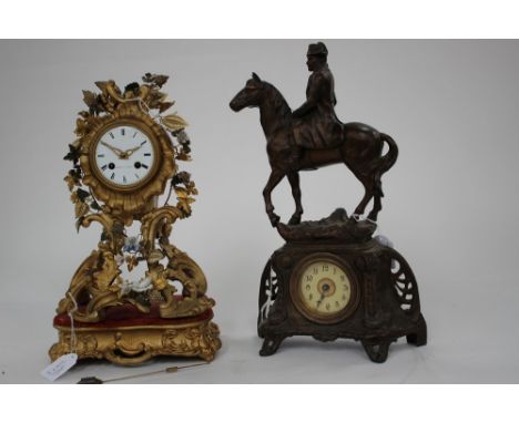 A gilt wood Leroy a Paris 8 day movement mantle clock on a gilt base with pendulum, decorated with grape wine and porcelain f