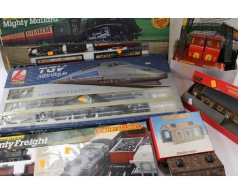Hornby OO gauge boxed: Jinty Freight, T.G.U. Atlantique, Mighty Mallard, with buildings, engine shed, further boxed items, et