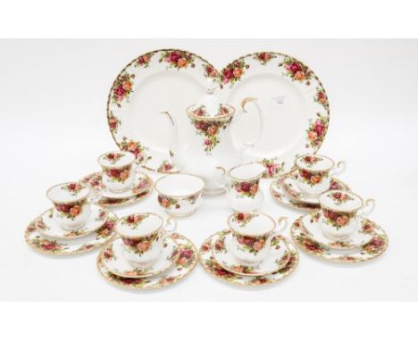 A Royal Albert 'Country Roses' coffee service for six including coffee pot, six cups and saucers, milk, sugar, six tea plates