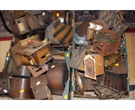 A box of Cuckoo clock cases, two mantle clock boxes 